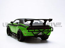 Load image into Gallery viewer, Green and black model car on a white background
