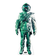 A life-size cardboard cutout of the character Beetlejuice from the 2024 film, standing upright with a green and silver space suit design.