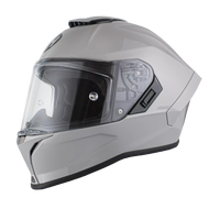 Gray motorcycle helmet with clear visor on a white background